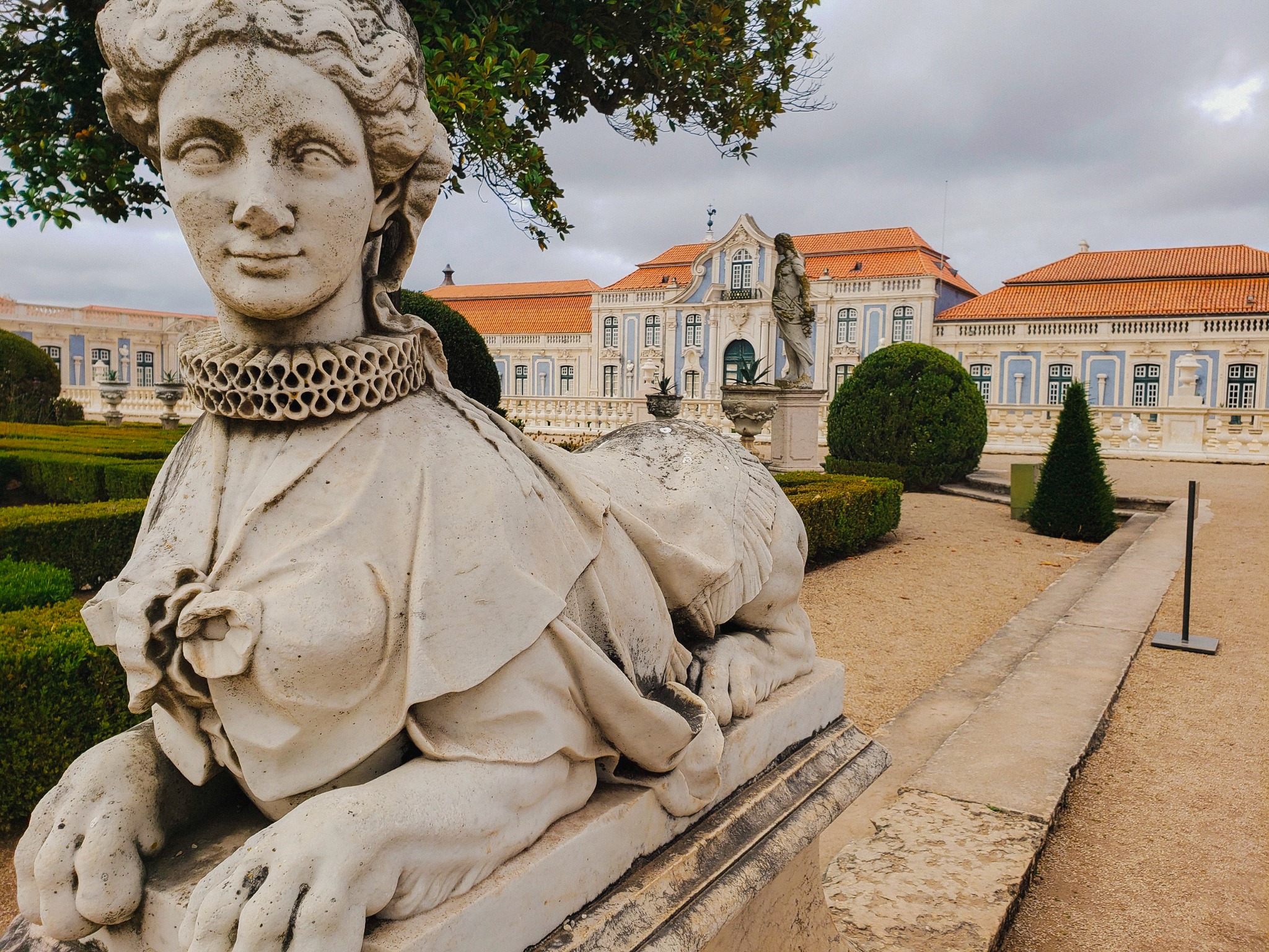 Sculpture and palace gardens at Queluz