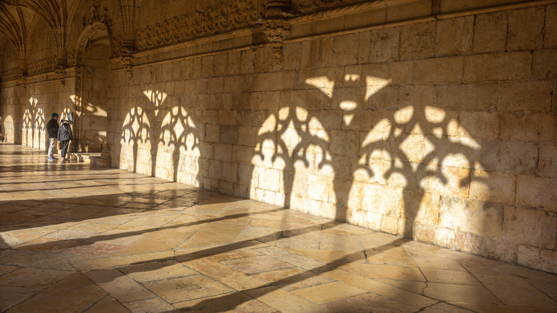 Sunlight and Gothic shadows in the Jerónimos cloister